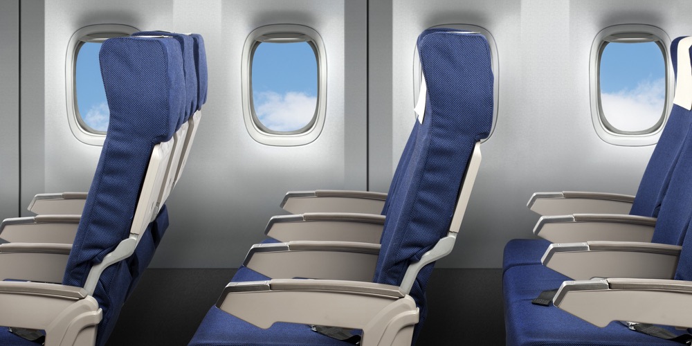 مقال - لماذا لا يمكن رفع ذراع المقعد الواقع على طول الممر بالطائرة؟